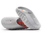 Nike Mind 001 Pregame Light Smoke Grey Mules - vista frontal lateral